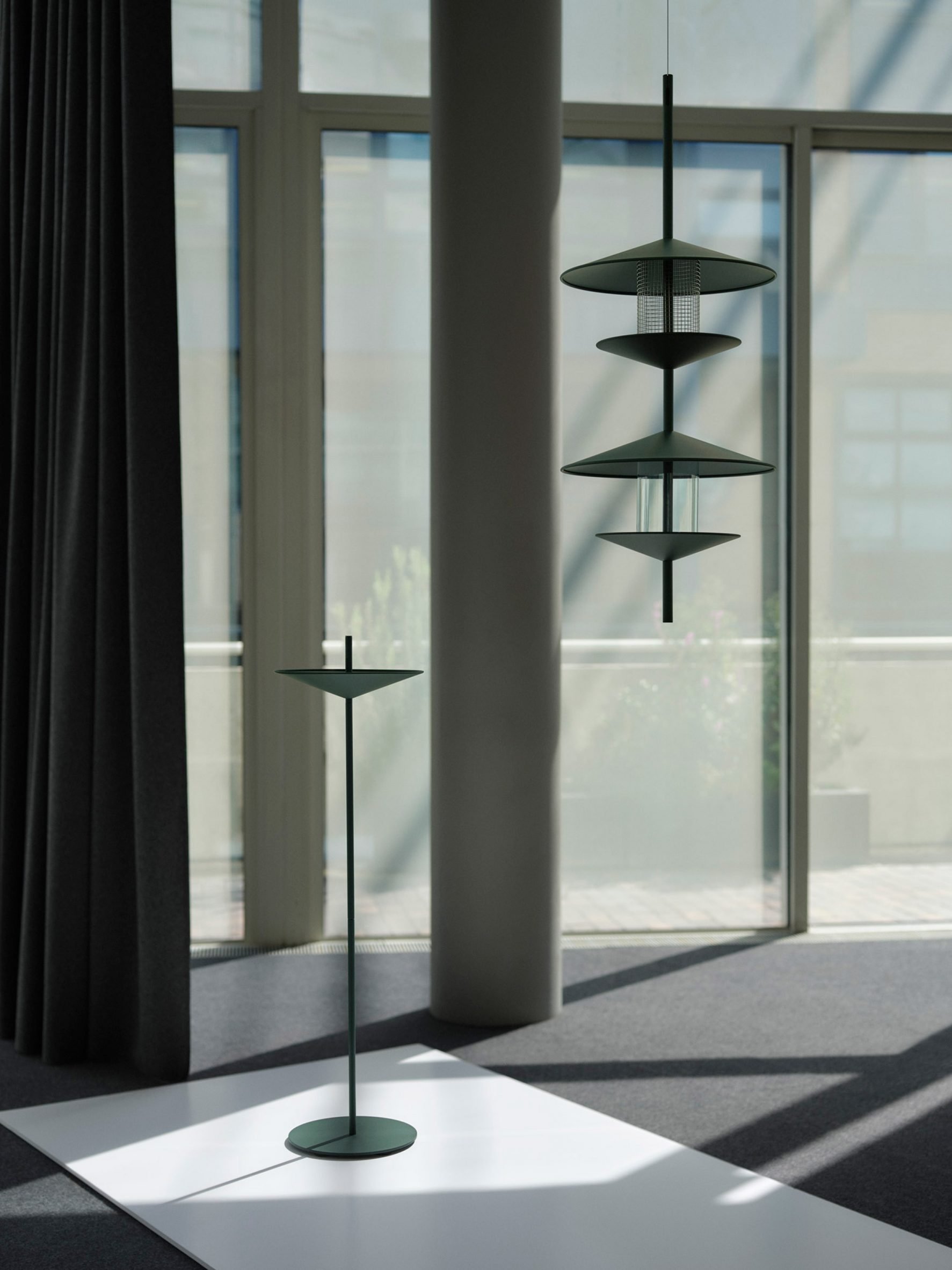 Norman Foster's green aluminium birdhouse